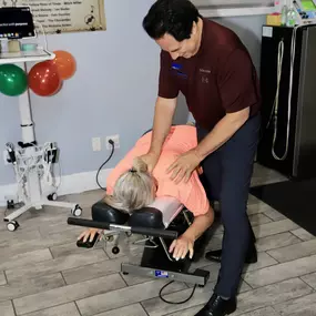 Dr. Dahmer adjusting a patient