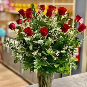 2 DZ Red Roses in a Vase accented with White Limonium