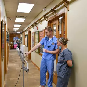 The dental team discussing a patient's exam results.