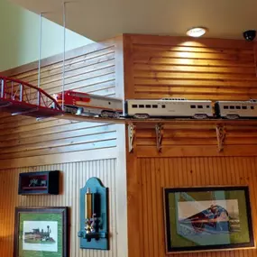 An interior view of Dental Depot's dentist office showing the miniature train track running throughout the office.