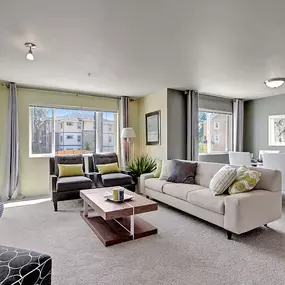 A living room with a fireplace and a couch.