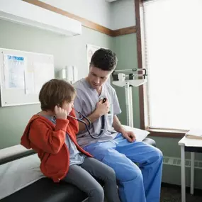 Nurse with Patient in Bed – “See Me as a Person” workshop.