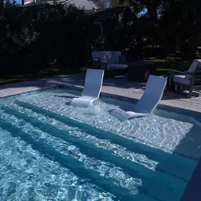 Tanning ledge with loungers