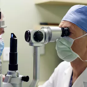 Dr. Konrad Filutowski conducts an eye exam
