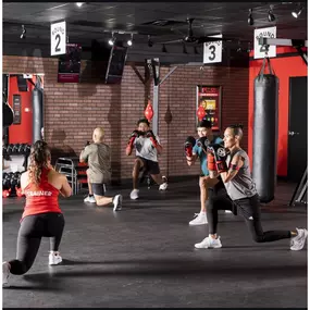 Fitness gym working out women with personal trainer