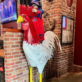 Large metal rooster at Anchor Bar Leesburg that everyone can sign.