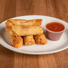 Buffalo's pizza logs with a side of pasta sauce.