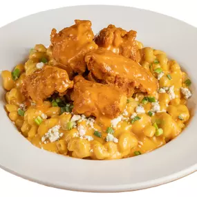 Gooey Mac and Cheese topped with Original (Medium) chicken tenders.