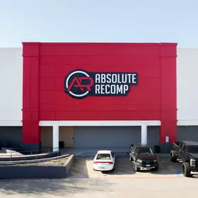 Absolute Recomp’s bold red exterior dominates the Fort Worth fitness scene, making it the go-to spot for serious training at the best gym in the city.