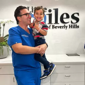 Dr. Sepehr Nassiripour with a patient