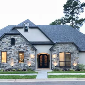Beautifully customized stucco and stone home by Christian Builders. There was not a detail missed from the custom 8' double iron doors to georgous tile work. This home was designed to maximaze space on this lot at The Crossing Neighborhood, in Tyler.