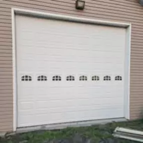 Bild von Garza Garage Door