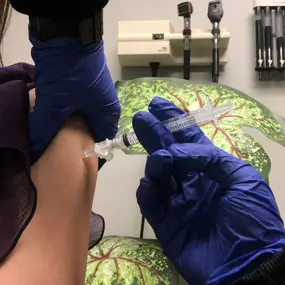 A patient receiving pain management injection at Health for Life Naturopathic Medicine