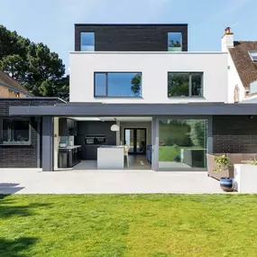 Modern white and black home with glass doors and open living space in Lilliput, Poole.