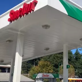 Sinclair gas station fueling island