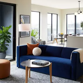 Designer Furnished Living Room with City Views at Sentral West Midtown at Star Metals