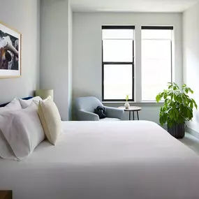 Bedroom with Window Reading Nook at Sentral East Austin at E. 6th