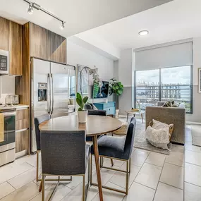 Large Kitchen, Dining, and Living Room with Huge Windows at Sentral Wynwood
