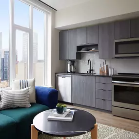Stainless Steel Kitchen and Living Room with a View at Sentral First Hill