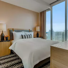 Bedroom with Floor to Ceiling Windows at Sentral DTLA at 732 S. Spring