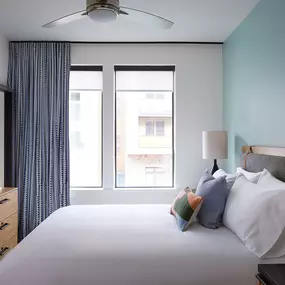 Bedroom with Large Windows at Sentral East Austin at 1614 E. 6th