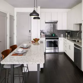 Large Kitchen with Stainless Steel Appliances at Sentral East Austin at 1614 E. 6th