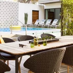 Relax Poolside with Friends at Sentral East Austin at 1614 E. 6th