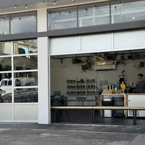 Converted garage with a bright indoor space.
