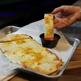 Our flatbread smothered in our four-cheese blend and our secret spice, served with marinara