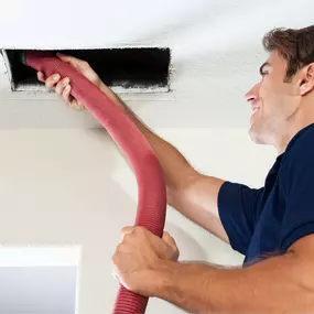 Sailor's technician is cleaning the air ducts in a customers home.