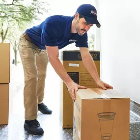 To make it relevant for your business, XTRM Restoration, the description should focus on how this image symbolizes the final steps of your service: delivering property back to a client or handling materials for a job efficiently.