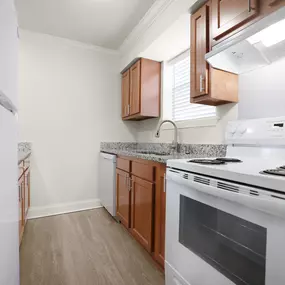 Renovated Kitchen with Granite Countertops & Updated Cabinetry