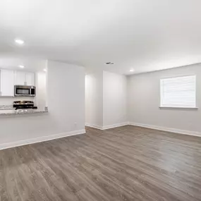 Open Living Spaces & Vinyl Plank Flooring Throughout