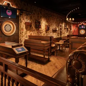 Flight Club is a high-energy social venue combining cutting-edge darts with elevated eats, curated beers, and a lively lounge vibe.
