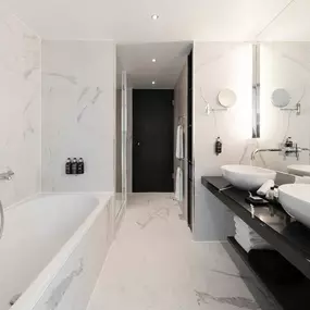 Bathroom with tub and separate shower