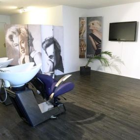 Bild von Coiffeur mit Herz