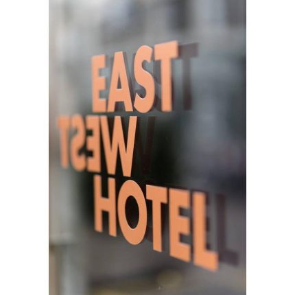 Logo od East West Hotel Basel