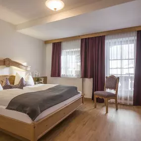 Schlafzimmer in der Ferienwohnung Glück - Appartements Schedererhaus