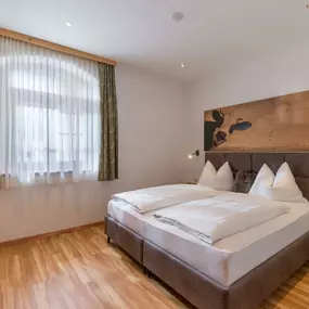 Schlafzimmer in der Ferienwohnung Glück - Appartements Schedererhaus