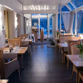 Wintergarten des Restaurants im Hotel Silberhorn in Lauterbrunnen