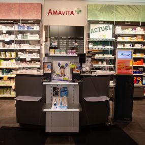 Pharmacie-Amavita-Espacité-caissier