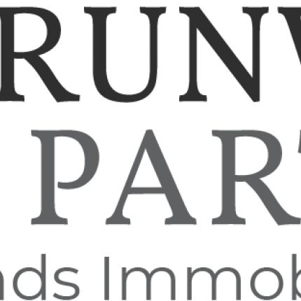 Logotyp från Grunwald & Partner - Immobilienmakler Nordfriesland