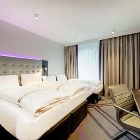 Premier Inn Hamburg City Klostertor hotel family room with double bed and two singles beds