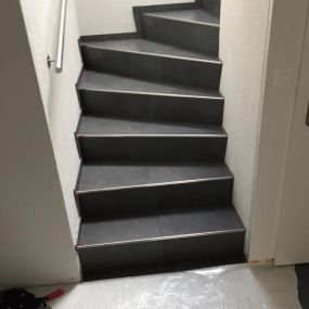 Jost Bodenbeläge Plattenarbeit Treppe