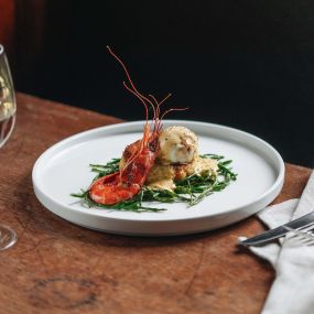 Salmon & smoked cod fishcake, shell-on king prawn, hollandaise, samphire