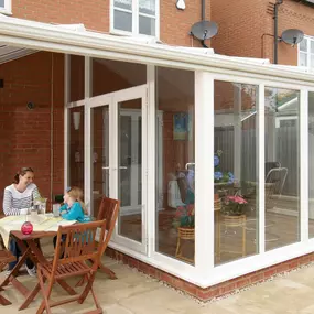 Enjoy the outdoors from the shelter of a veranda - perfect protection from summer showers and breezes, either on its own or added to a conservatory.