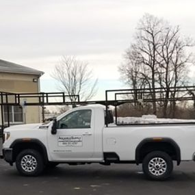 Aquarius Supply loading and delivery trucks