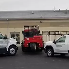 Aquarius Supply loading and delivery trucks