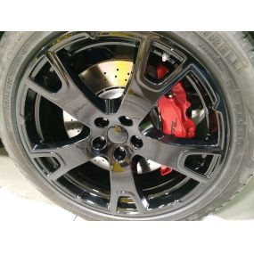 Painted brake calipers give wheels a clean pop of color!