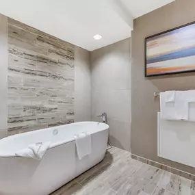 Caesars Republic Lake Tahoe lake view balcony suite view tub. Elevate your adventure at Caesars Republic Lake Tahoe, the very first casino hotel built on the South Shore.